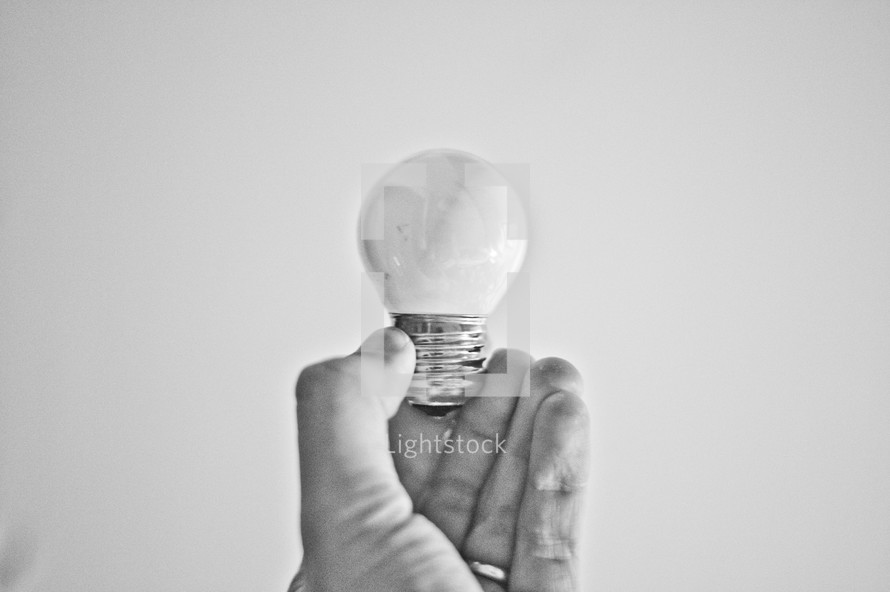 Man holding lightbulb