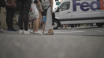 people using  a crosswalk in NYC 
