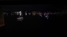 Fireworks over water with Boats watching