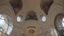 Paris, France - March 20, 2024: The ceiling decorations inside the Petit Palais, Paris, showcase intricate paintings, artistic designs and statues.