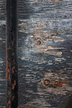 Wood texture and rusted pole