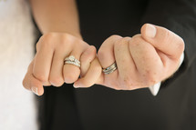 Couple showing their wedding rings