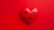 Smiley face on red heart on red background.