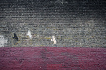 doves painted on a brick wall