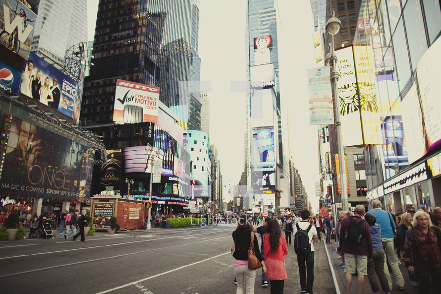 People walking around Times Square