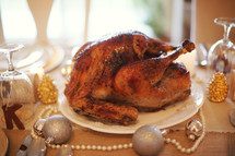 Fresh roasted turkey on a decorated table