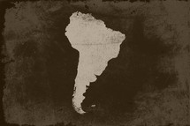 Grunged South America map background.