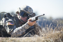 Soldier shooting machine gun