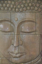 Indonesia wall carving  of Buddha