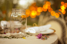 empty mason jar sitting on a table