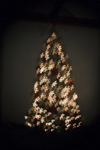 Christmas tree of illuminated whie doves.