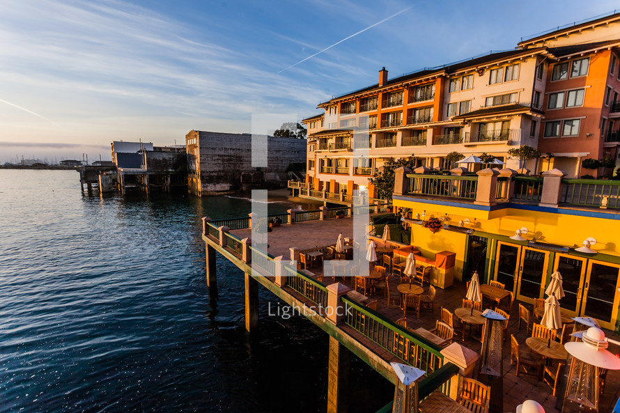 California Coast, Monterrey, Restaurant & hotel  dock deck at sunset