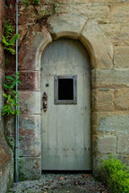 door in an arched doorway