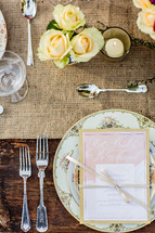 Place setting at wedding rustic chic plate fork spoon  menu country