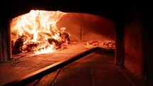 Cooking an Italian Neapolitan Pizza in the Wood Fired Oven