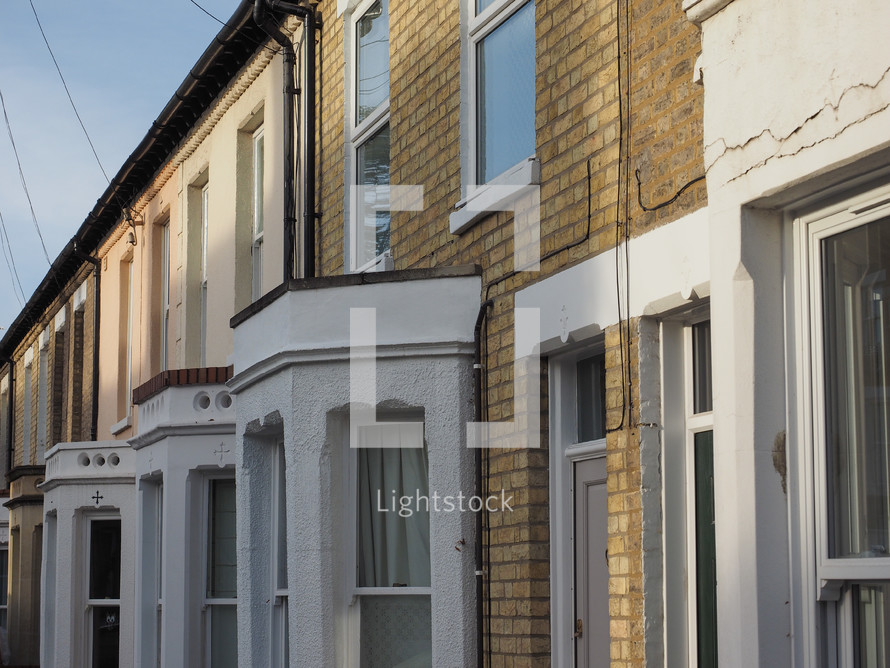 Row of traditional British houses with bow windows