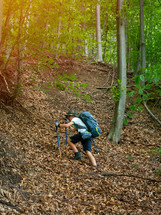 a child hiking through the woods 