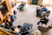 fellowship of families in a home for a prayer meeting 