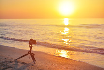 filming the ocean at sunset 