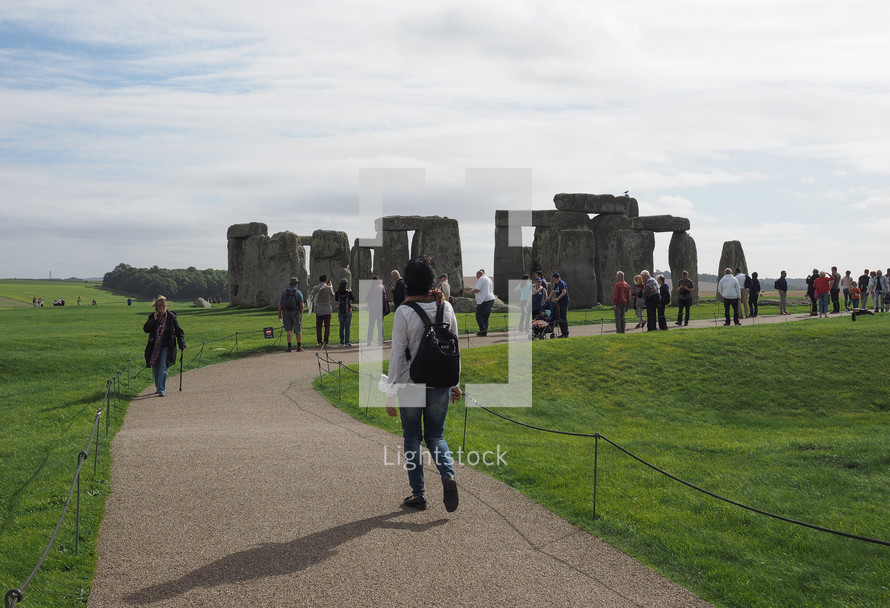 WILTSHIRE, ENGLAND, UK - CIRCA SEPTEMBER 2016: Tourists visiting ruins of Stonehenge prehistoric megalithic stone monument