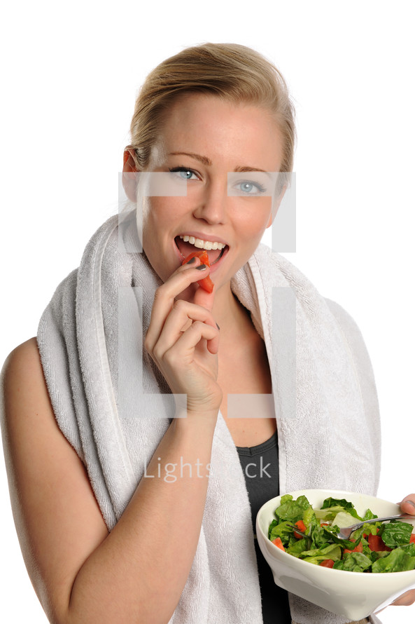 woman eating a salad 