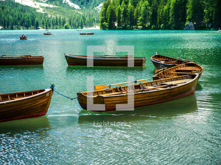 boats floating on a lake 