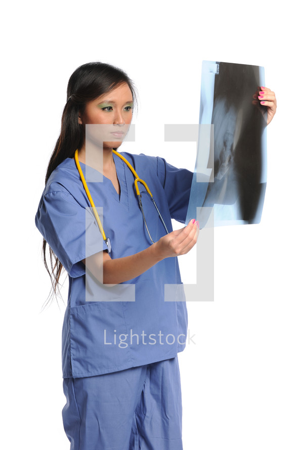 radiologist holding an X-ray 