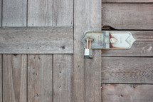 padlock on a wooden door 