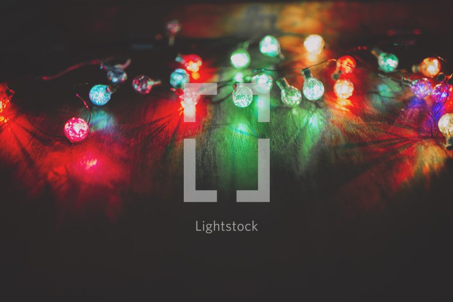 selective focus photo of colourful Christmas lights