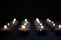 rows of candles with copyspace