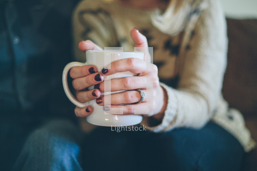 woman holding mug