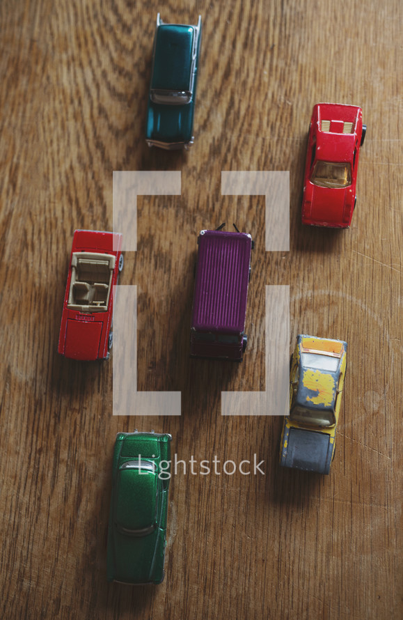 a grouping of toy cars from above
