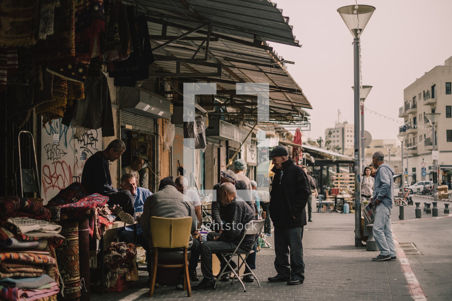 people at an outdoor market in Jerusalem 