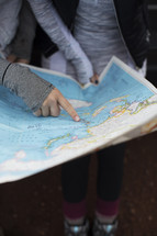 Two people looking at a map.