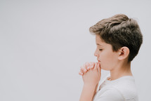 child praying 