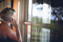 woman taking on the phone 