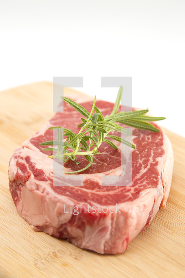 Raw Ribeye Steak on a White Background