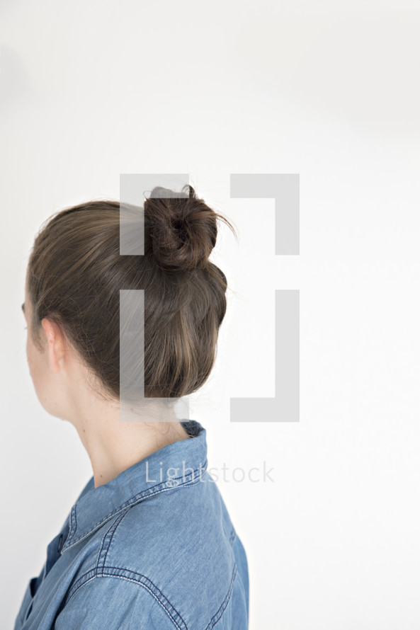 woman with hair in a bun