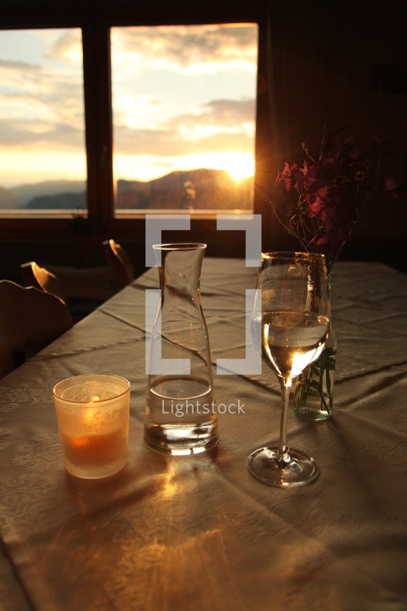 wine glass, wine, wine carafe, candle, window, sunset