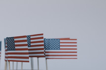 American flags against a white background.