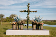 floral altar with cross