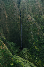 waterfall off the side of an island mountain 