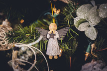 Wooden angel ornament on a Christmas tree