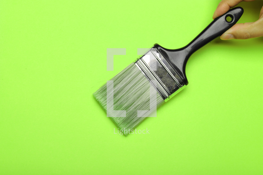 paint brush on a green background 