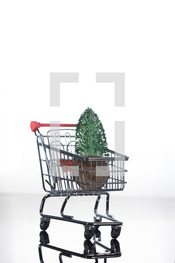 shopping cart with a Christmas tree