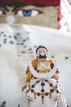 statue of a woman on an elephant in Tibet