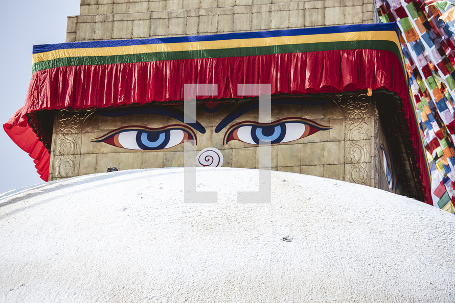 face and colorful banners in Tibet 