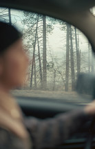 blurry image of a man driving 