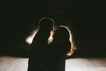Couple silhouette in cold weather