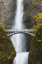 bridge over a ravine and waterfall 